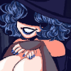 A witch with a curly blueish dark bob of hair, MASSIVE boobs and a witch hat obscures her eyes. In this icon she's leaning over and resting her hands under her chin and over... her big ol bazonkas.